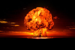 A nuclear explosion in an outdoor setting to illustrate the nuclear testing conducted at Enewetak Atoll.